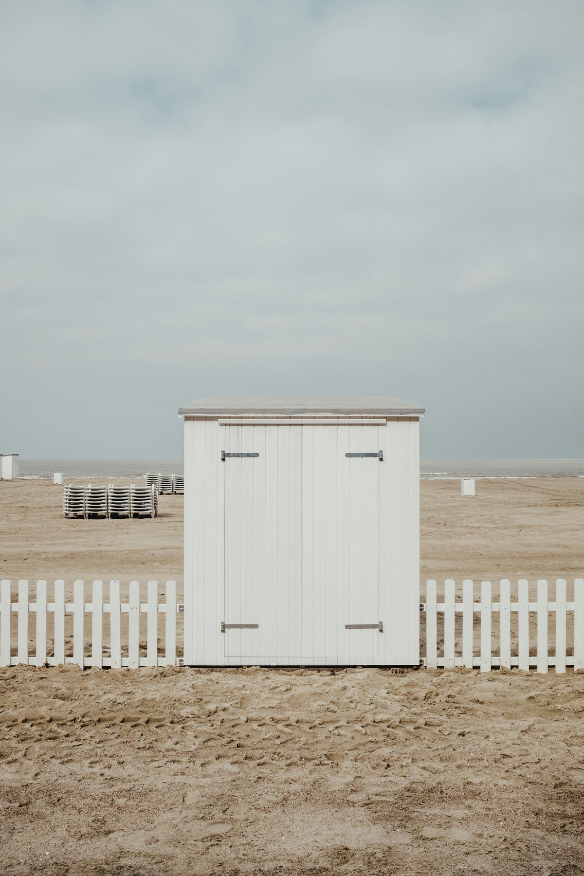 White beach cabin on the sand in Knokke